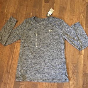 Women’s Under Armour heat gear, long sleeve shirt.
